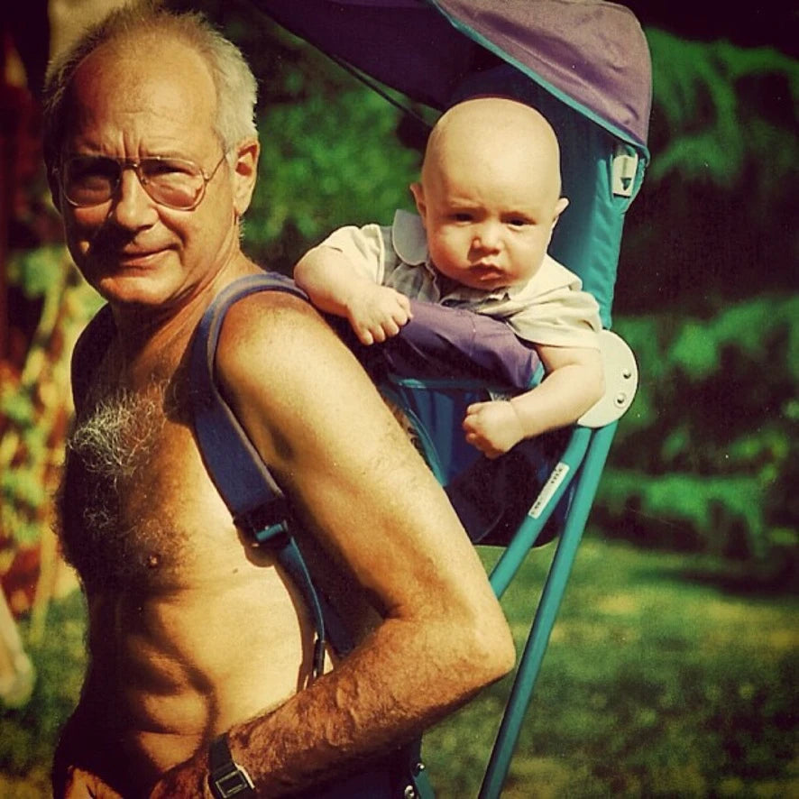 Bernard Chevojon carrying Charles as a baby.