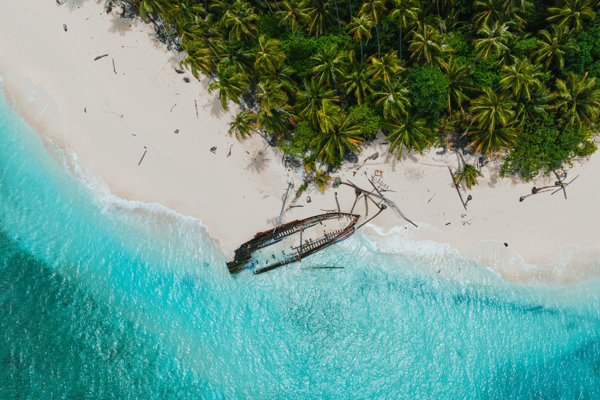 Wreck on the beach, close top-down aerial